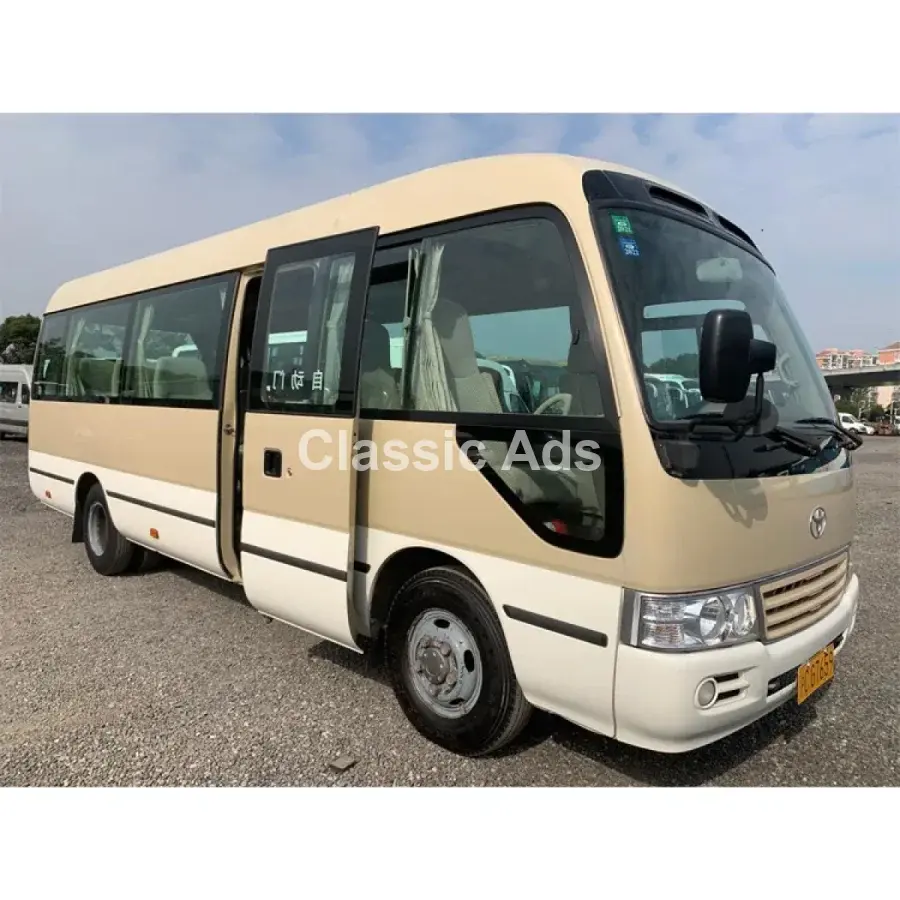 Toyota Coaster Minibus - Image 1