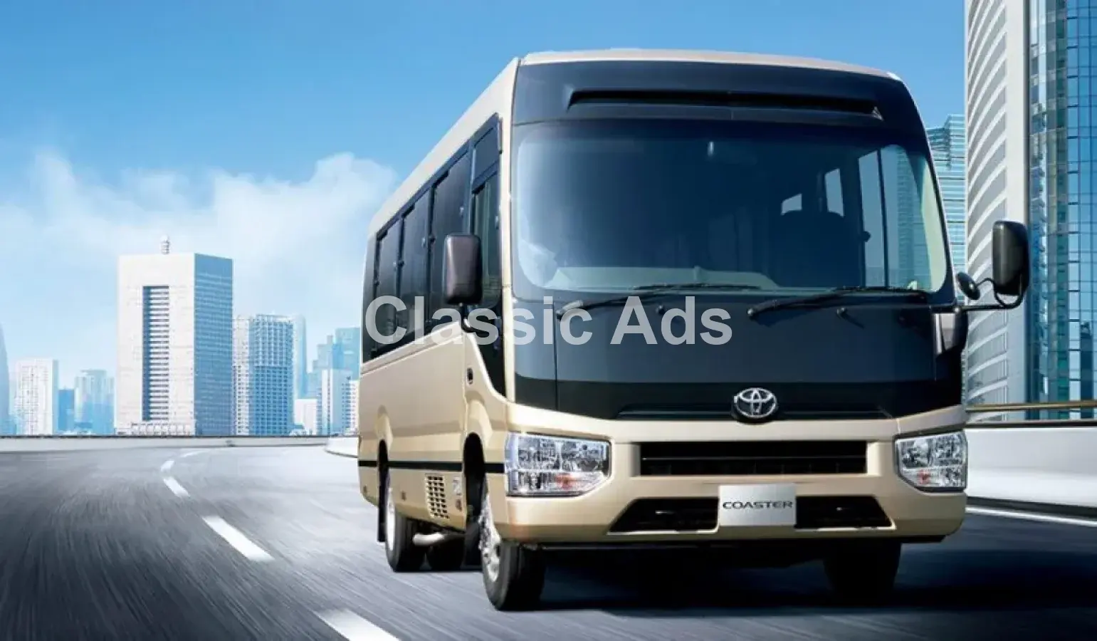 Toyota Coaster Minibus - Image 2